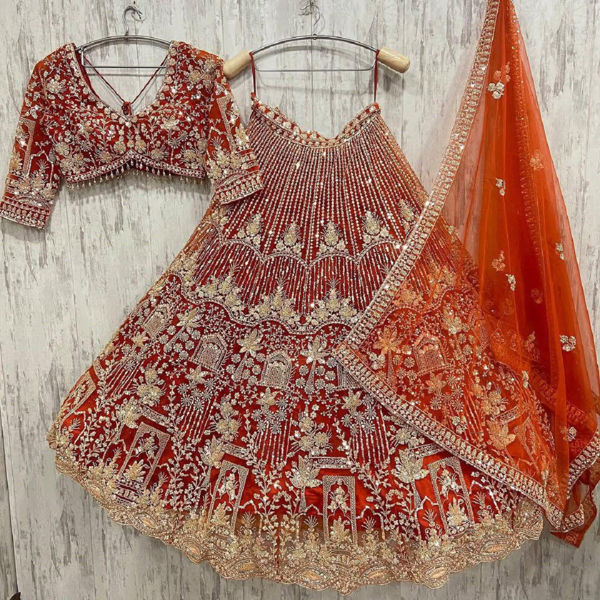 Orange Heavy Embroidered Lehenga Choli