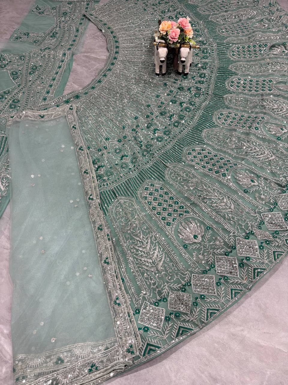 Rama Green Soft Net Wedding Wear Beautiful Lehenga Choli